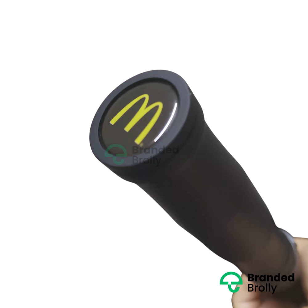 Logo in handle base on a branded auto open golf umbrella