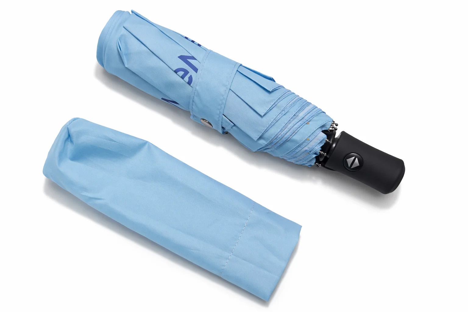 BBT001 folded umbrella beside its matching sleeve